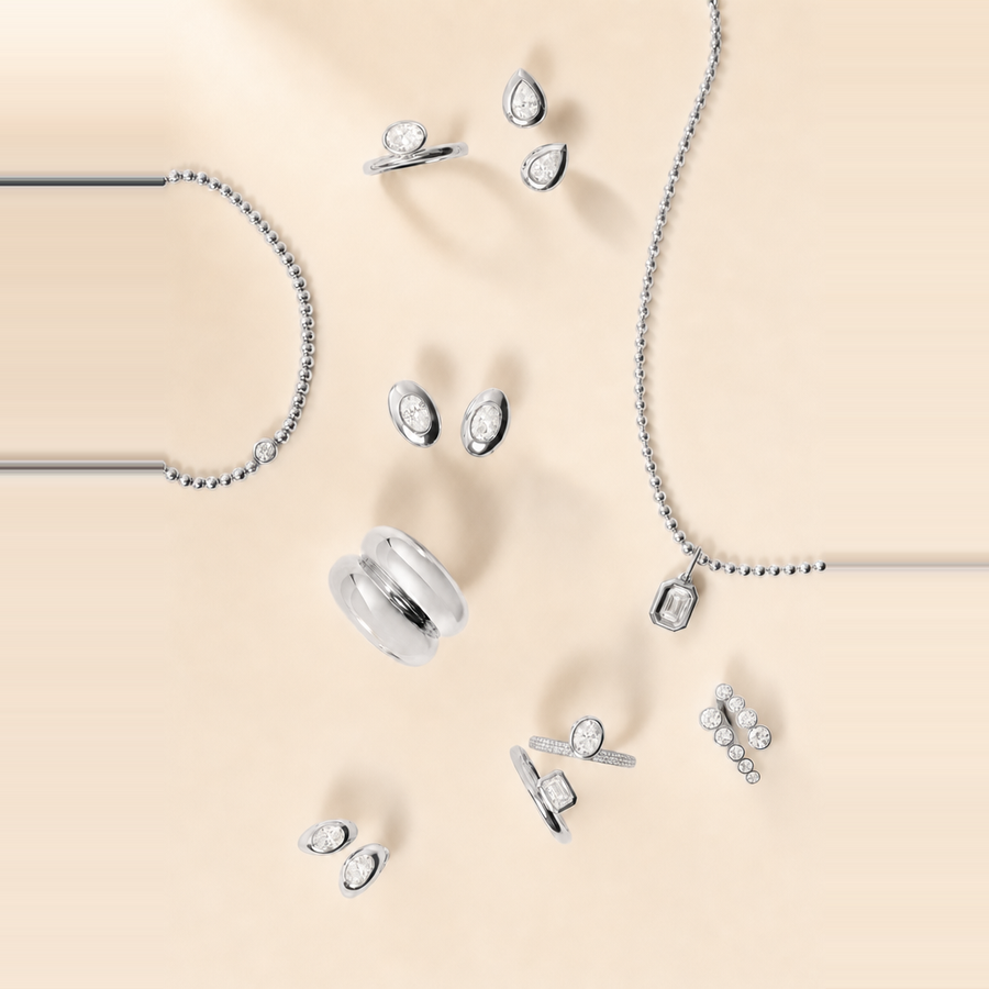 Bezel Pear Diamond Studs — view 5