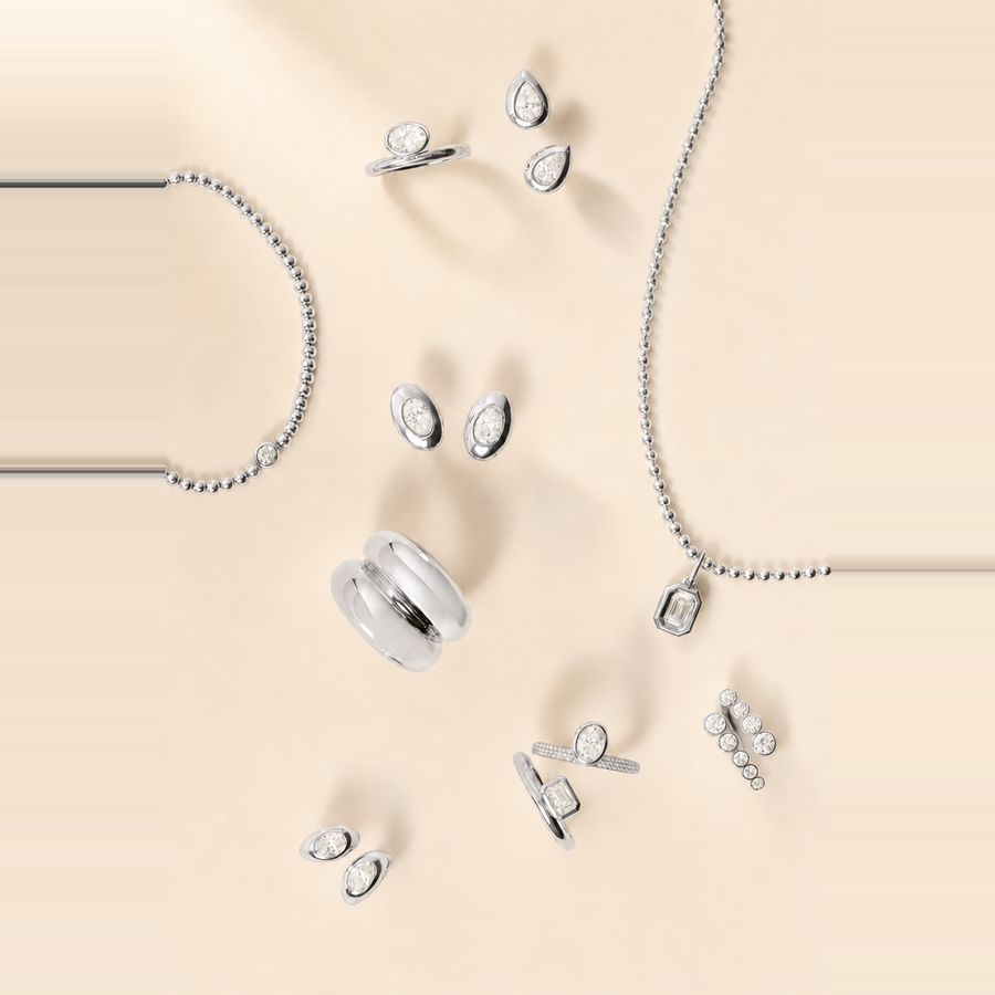 Bezel Pear Diamond Studs — view 2