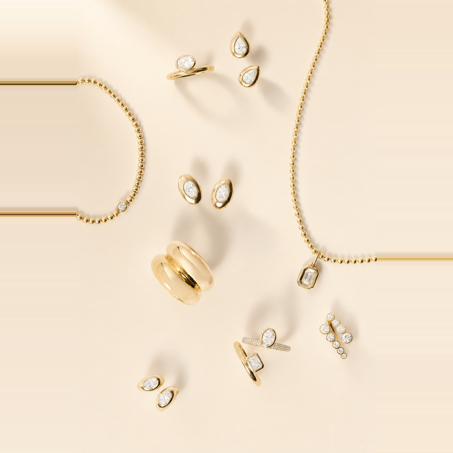 Bezel Pear Diamond Studs — view 3