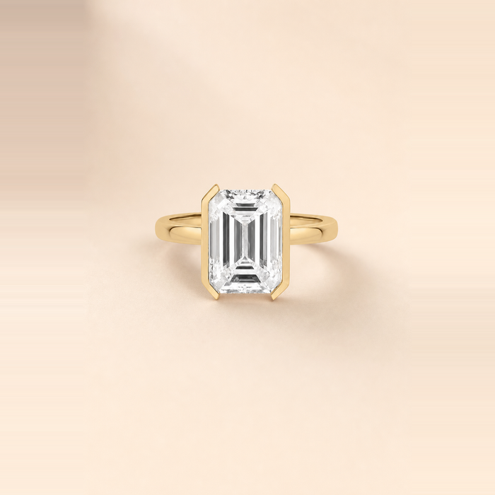 Emerald Half-Bezel Diamond Solitaire