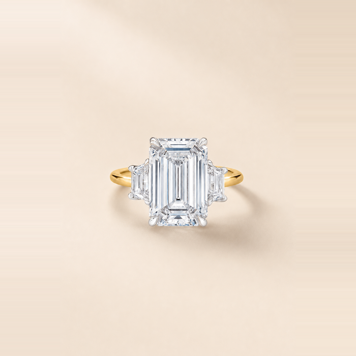 Emerald Three Stone Diamond with Tapered Trapezoid Side Stones