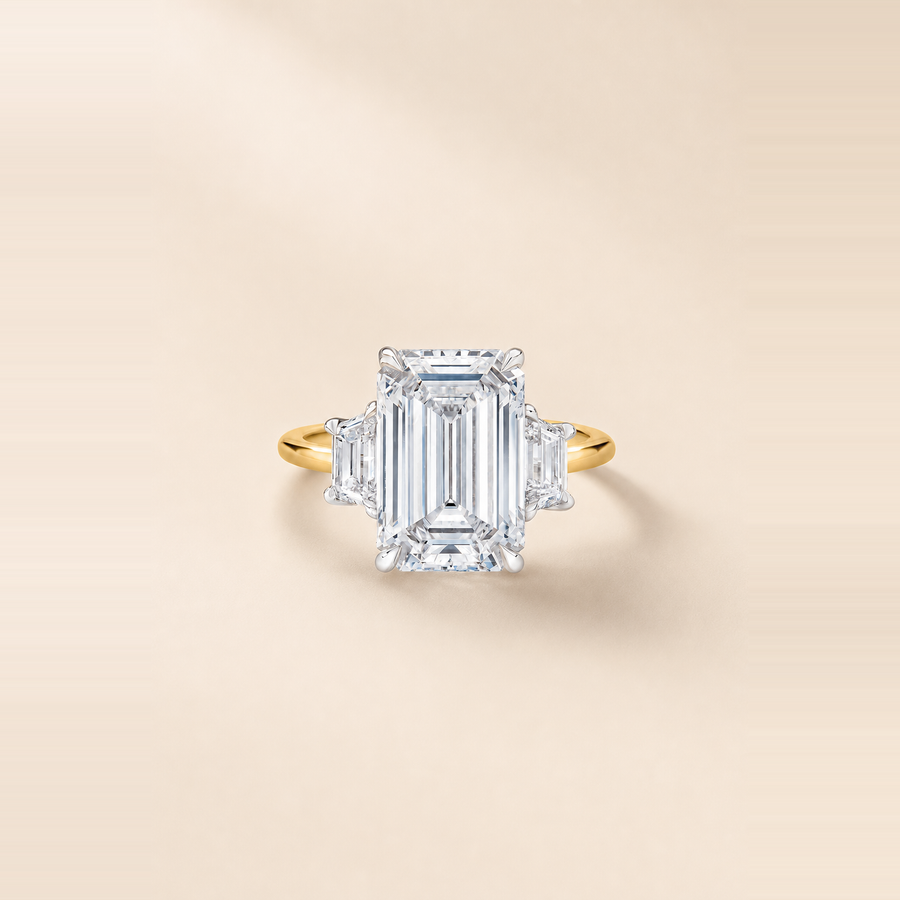 Emerald Three Stone Diamond with Tapered Trapezoid Side Stones &mdash; view 1