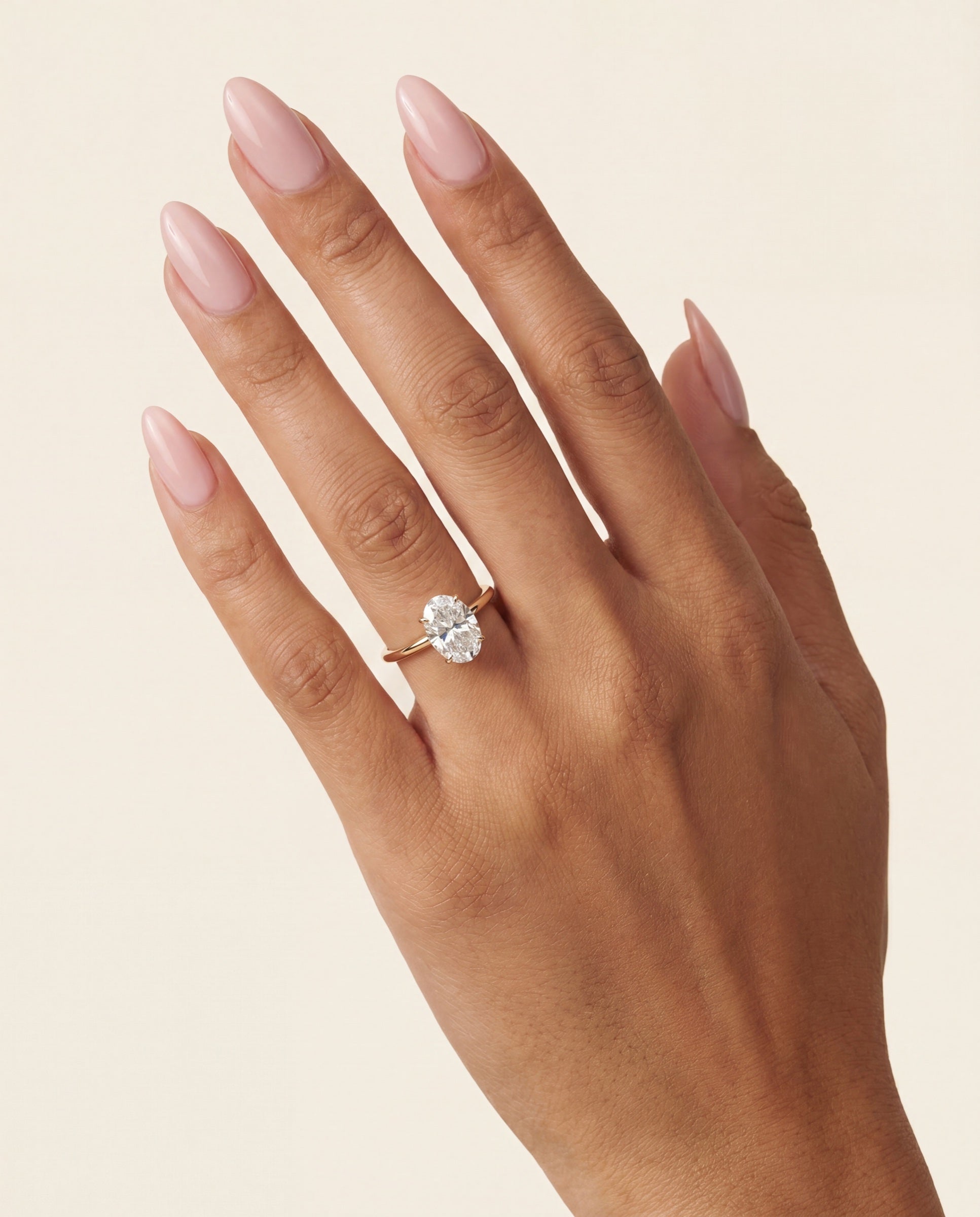 Oval Diamond Solitaire with Hidden Halo &mdash; Worn