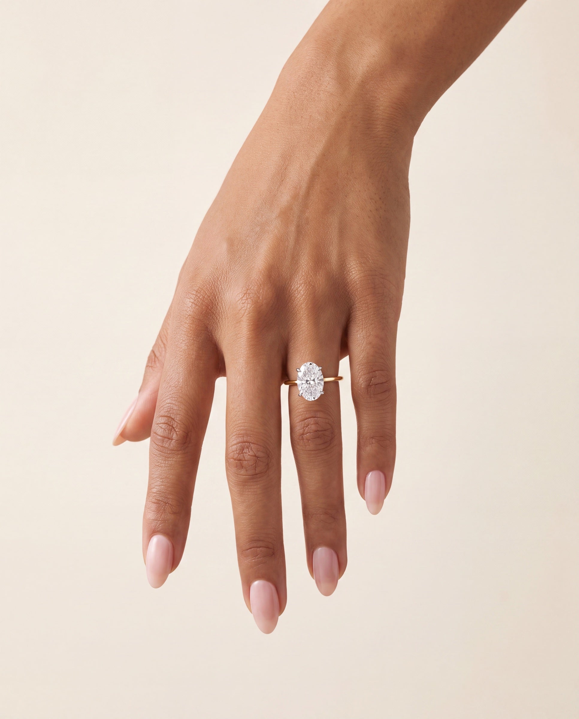 Oval Solitaire Diamond with Hidden Halo and Extra Thin Band &mdash; Worn